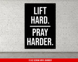 a man standing next to a tall black box