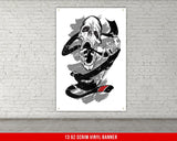 A white, checkered-patterned fabric is rolled up and secured with a gold ring, which is fastened with a gold ring.