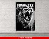 a black and white picture of a lion with its mouth open