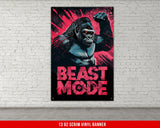 a poster of a gorilla on a brick wall