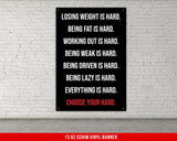 a man standing next to a tall black box