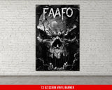 a black and white picture of a skull on a brick wall