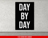 a black and white sign that says day by day