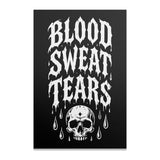 Blood, Sweat, Tears text above a skull with dripping tears.