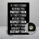 Black banner with text about protection, respect, and destruction, with grommets.