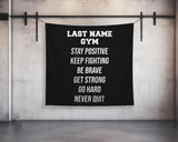 a black wall hanging on a metal bar