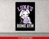 Cartoon bunny in workout clothes holding a dumbbell.