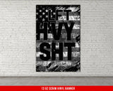 a white brick wall with a black and white poster on it