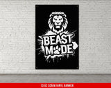 a black and white picture of a lion on a brick wall