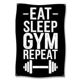 Black banner with white text: Eat, Sleep, Gym, Repeat, and a dumbbell.