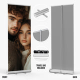 a couple standing close together, with a focus on their faces and expressions. The image also includes a travel bag included in the product.