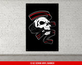 A white, checkered-patterned fabric is rolled up and secured with a gold ring, which is fastened with a gold ring.