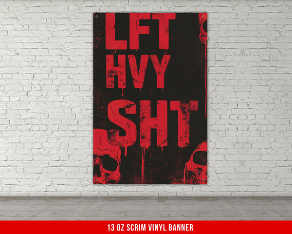 a red and black poster on a white brick wall