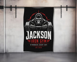 Gorilla holding barbell with "JACKSON IRON GYM STRONGER EVERY DAY EST 2026" text.
