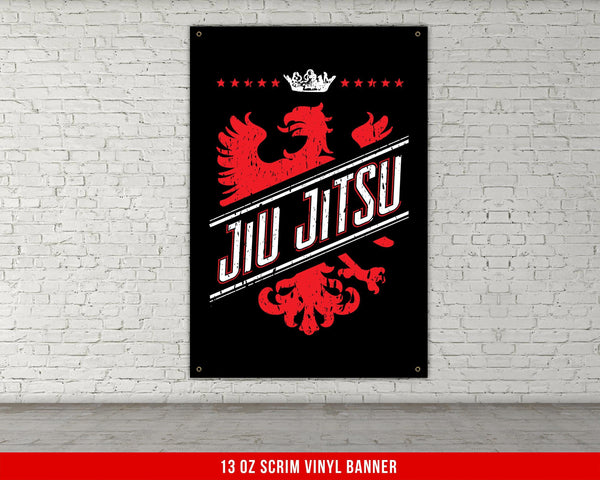 A white, checkered-patterned fabric is rolled up and secured with a gold ring, which is fastened with a gold ring.