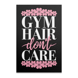 Gym Hair Don't Care text with floral accents on black background.
