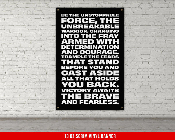 a black and white poster on a white brick wall