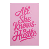 Pink card with "All She Knows is Hustle" in bold script.