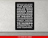 a black and white poster on a white brick wall
