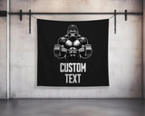 a black wall hanging with a picture of a gorilla