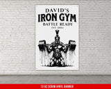 a poster of a man lifting a barbell in front of a brick wall