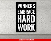 a sign that says winners embrace hard work