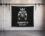 a black and white wall hanging on a wall