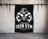 Johnson's Iron Gym logo with wolf and motivational text.