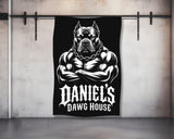 Black and white illustration of a muscular dog with "DANIEL'S DAWG HOUSE" text.