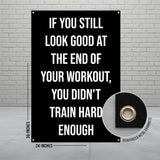 Black banner with motivational text about training hard, with dimensions.