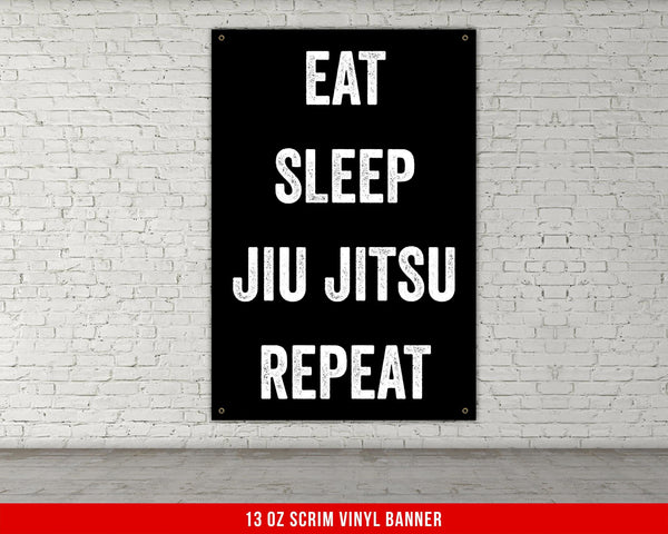 A white, checkered-patterned fabric is rolled up and secured with a gold ring, which is fastened with a gold ring.