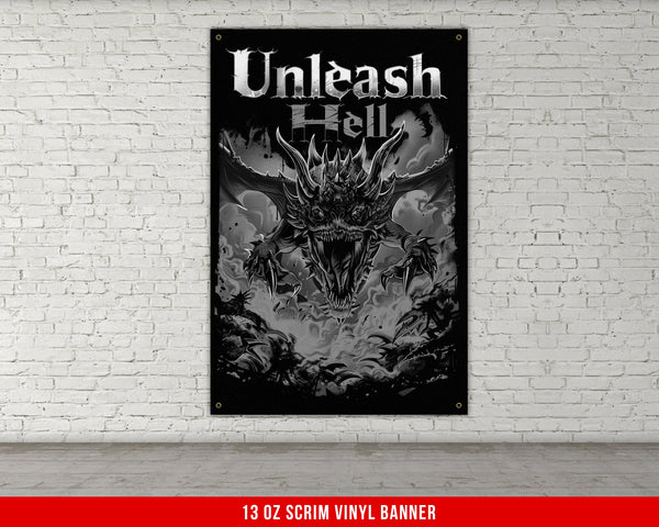a black and white poster hanging on a brick wall