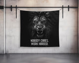 a black and white photo of a lion on a wall
