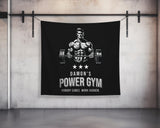 a gym banner hanging on a wall