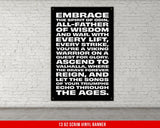 a black and white poster on a white brick wall