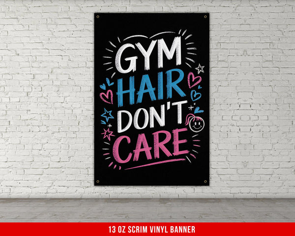 a gym sign on a brick wall with the words gym hair don&#39;t care