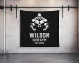 a black and white wall hanging on a wall