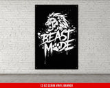 a black and white picture of a lion on a brick wall