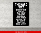 a man standing next to a tall black box