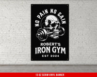 a gym sign with a skull holding a barbell