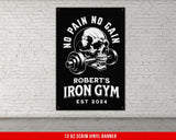 a gym sign with a skull holding a barbell