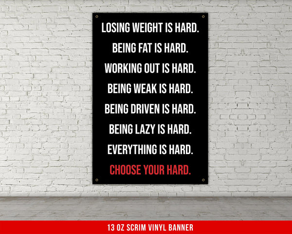 a man standing next to a tall black box