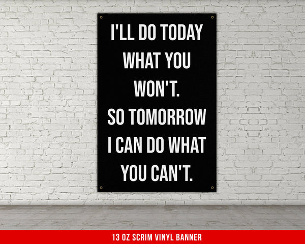 a black and white sign on a white brick wall