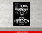 a picture of a man lifting a barbell in front of a brick wall