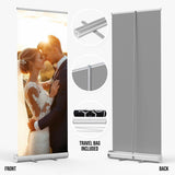 a bride and groom embracing each other, with a travel bag included.