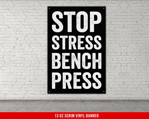 a black and white sign that says stop stress bench press