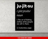 A white, checkered-patterned fabric is rolled up and secured with a gold ring, which is fastened with a gold ring.