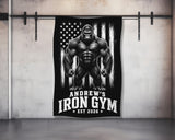 Black gorilla standing in front of American flag with "Andrew's Iron Gym Est 2026".