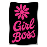 Pink "Girl Boss" text with a daisy on a black banner.