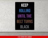 A white, checkered-patterned fabric is rolled up and secured with a gold ring, which is fastened with a gold ring.